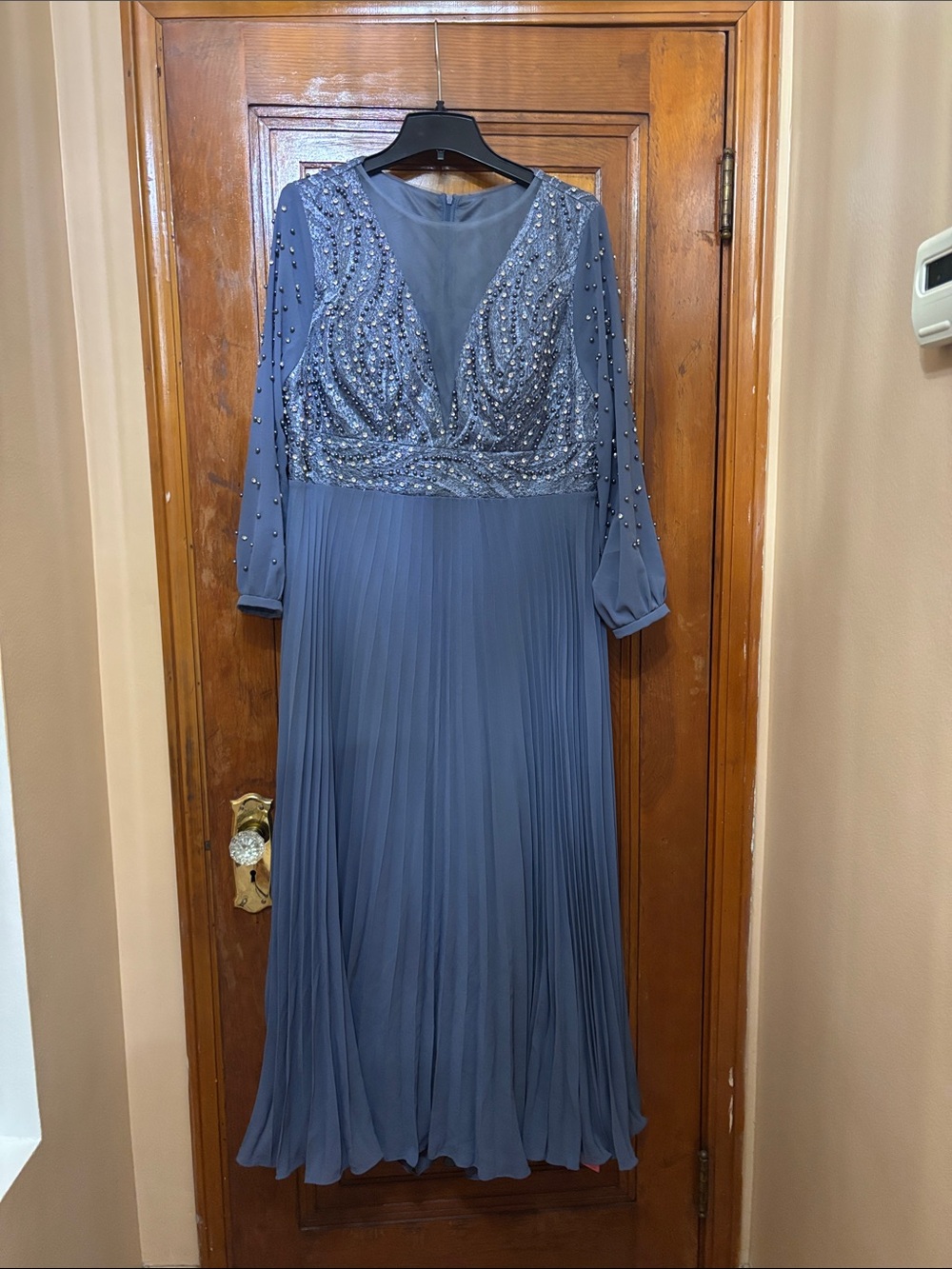 Light blue long sleeve evening gown